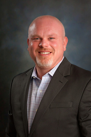 MB Biz Head-24_retouched Blue gray background vignette